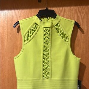 Vibrant Green Sleeveless Dress with Unique Front Design
